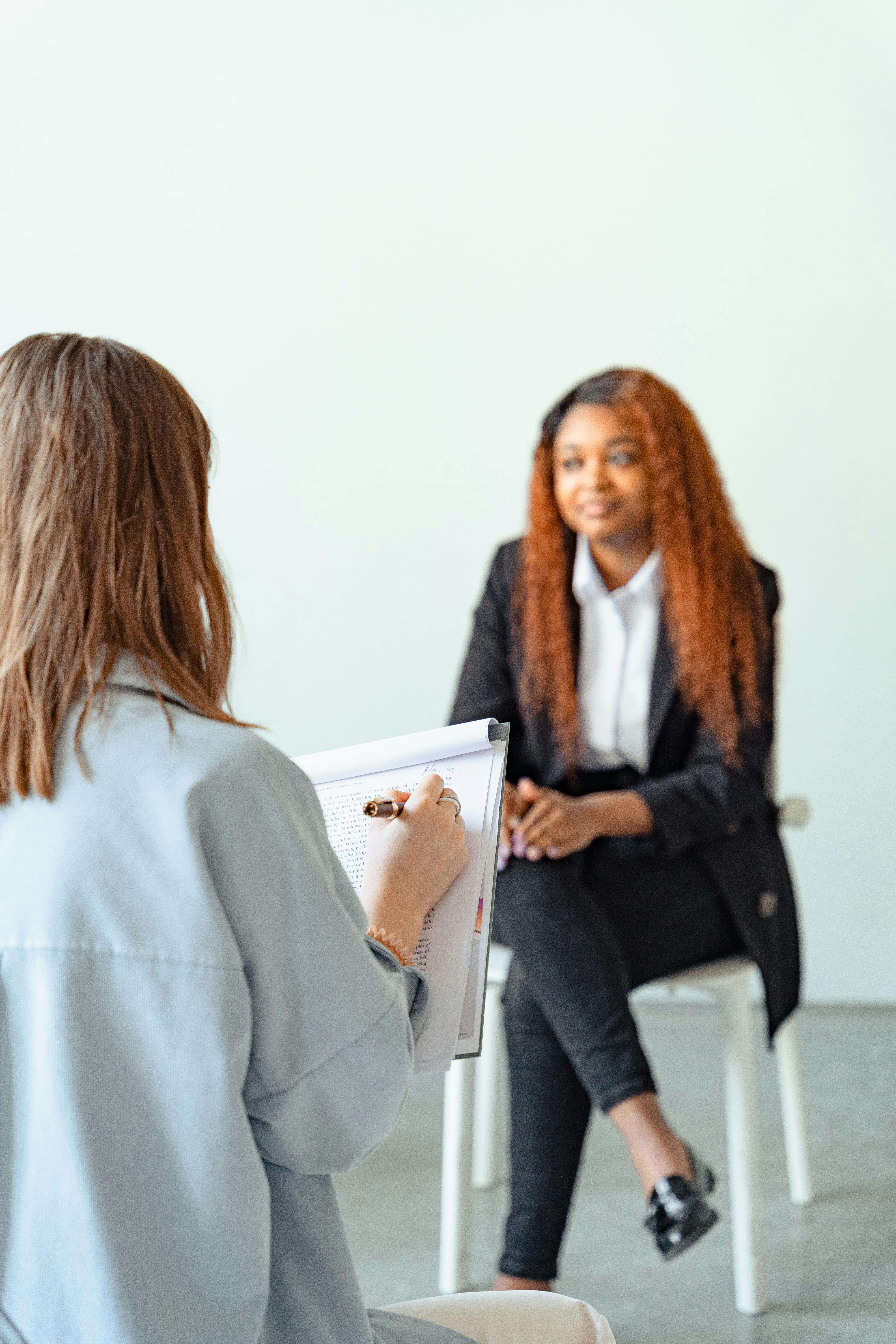 Teacher receiving counseling support in a calm, supportive environment